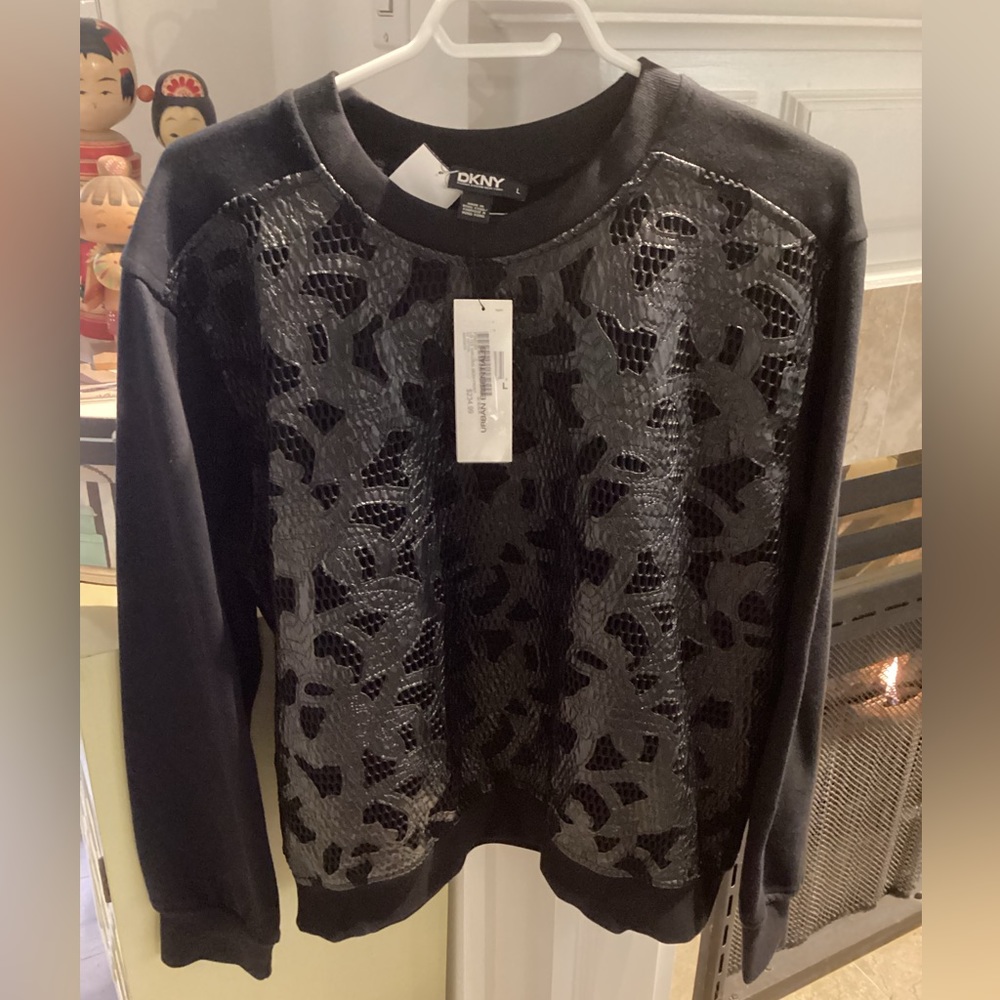 NWT DKNY black with floral mesh front terry sweater. Size L.